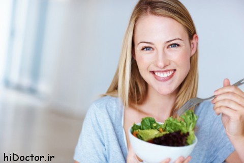 happy-woman-eating-salad-600-480x320