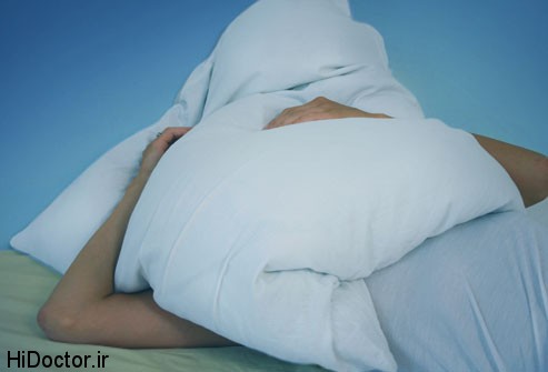 getty_rf_photo_of_pillow_on_head