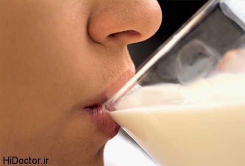 getty_rf_photo_of_woman_drinking_milk