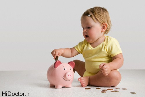 Baby with piggy bank