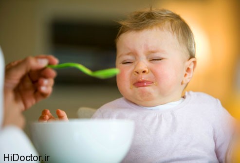getty rm photo of baby eating from spoon روش های ساده رفع بی میلی بچه به غذا