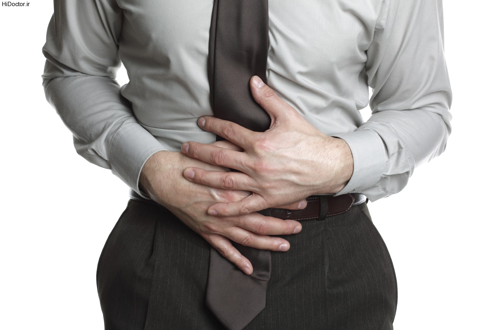 Businessman holding his stomach in pain or indigestion