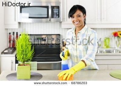 stock-photo-smiling-young-black-woman-with-sponge-and-rubber-gloves-cleaning-kitchen-68786203