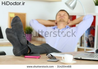 stock-photo-businessman-without-shoes-put-feet-on-table-settle-back-in-chair-and-raise-hands-to-relax-at-314204468