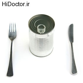 Blank tin can and place set with flatware over white background