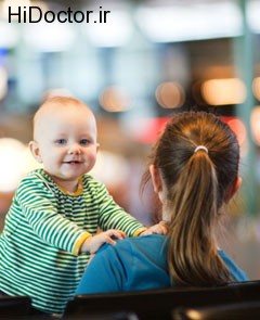 240x295-mother-and-baby-at-airport-92014201