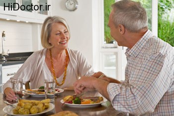 older-couple-enjoying-meal-350