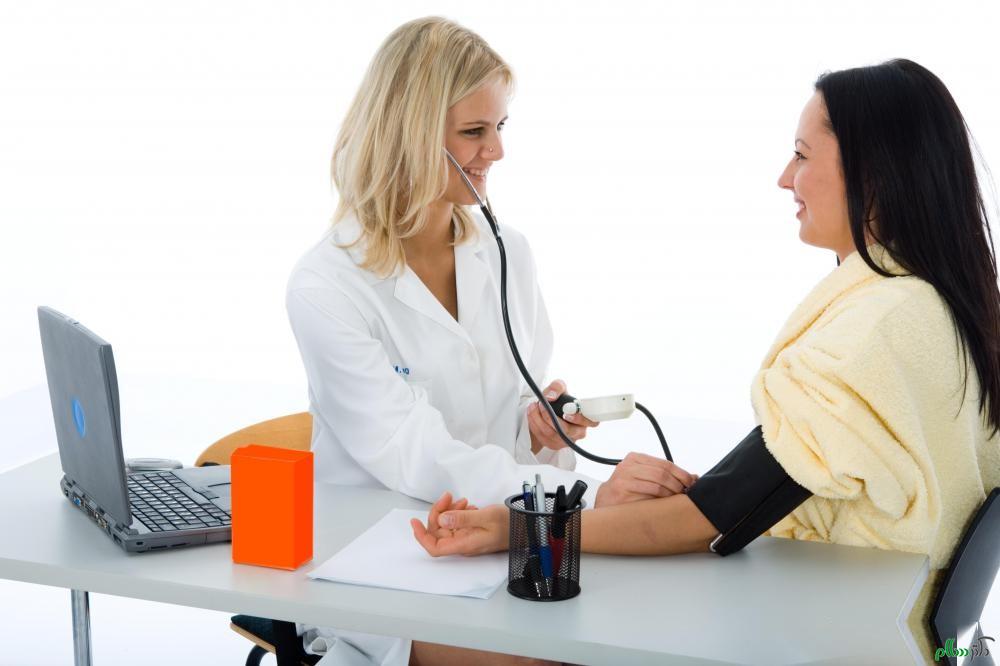 nurse-checking-blood-pressure