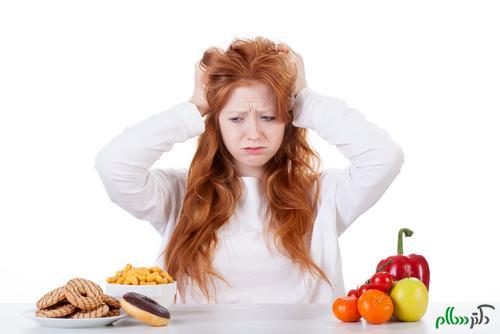 woman-holding-hands-head-looking-food