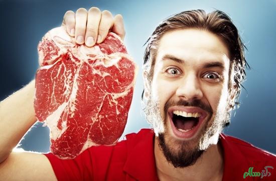 happy-man-holding-raw-steak