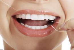 پیشگیری از پوسیدگی دندان با نخ دندان